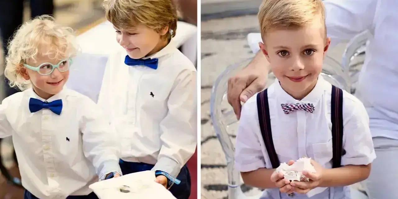 Dwóch chłopców w eleganckich strojach niesie obrączki na poduszce. Jeden z nich ma okulary.