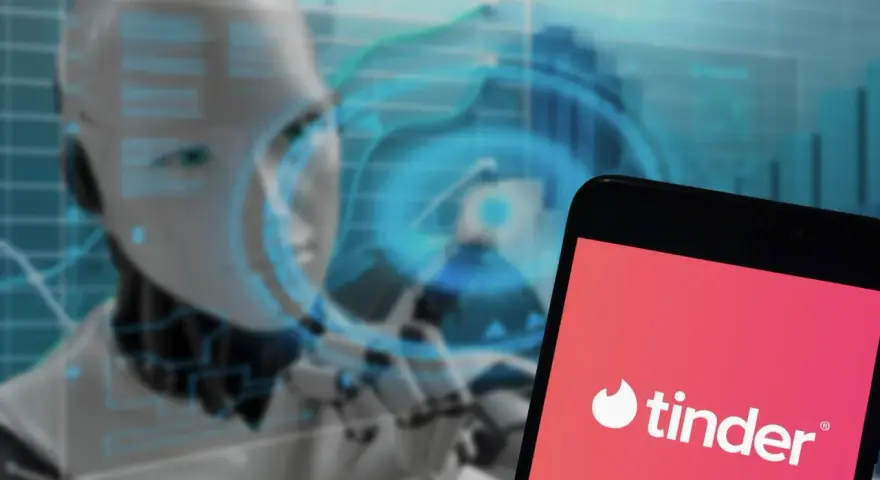 Robot analizujący dane, obok ekran telefonu z logo Tinder. Czy to przyszłość randek dla intj?